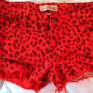 Red and black leopard distressed shorts